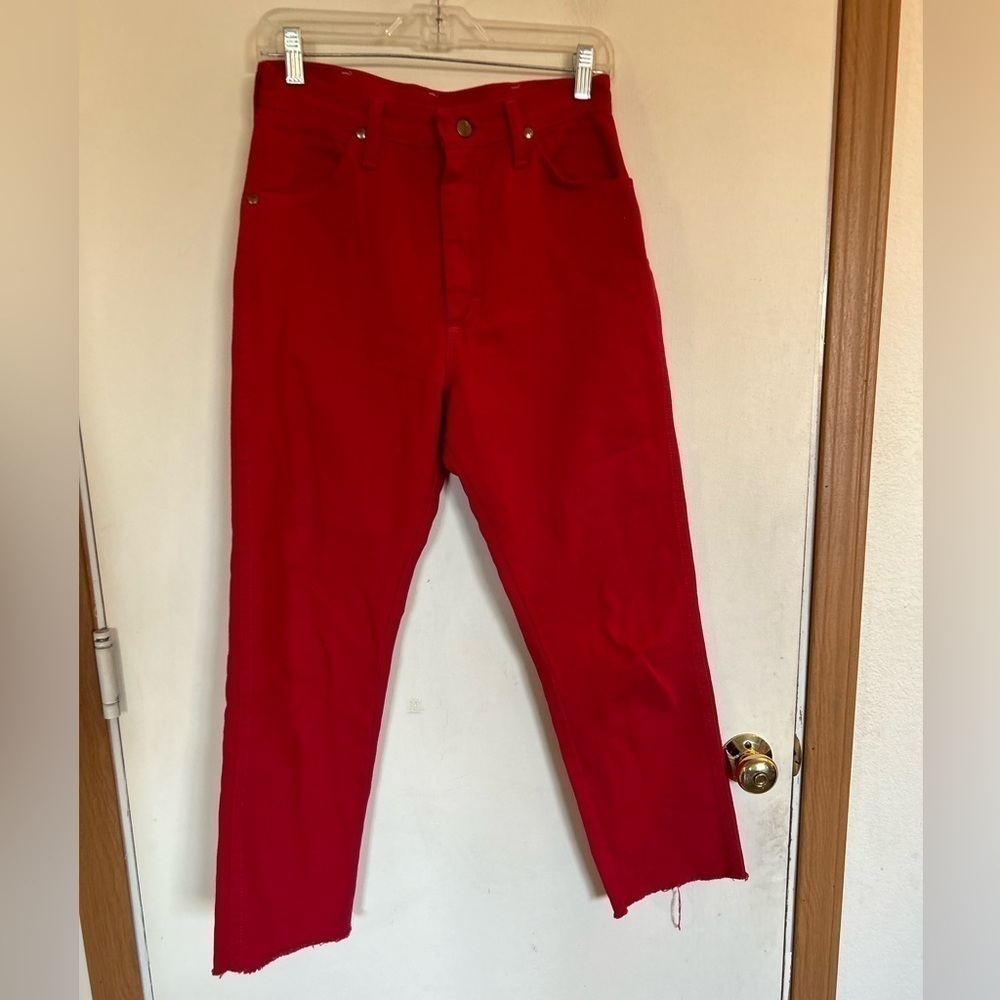 Wranglers, 7 x 32 ladies button fly red denim jeans with raw hemline